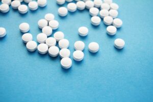 Representation of the abortion pill or Tylenol and their side effects.